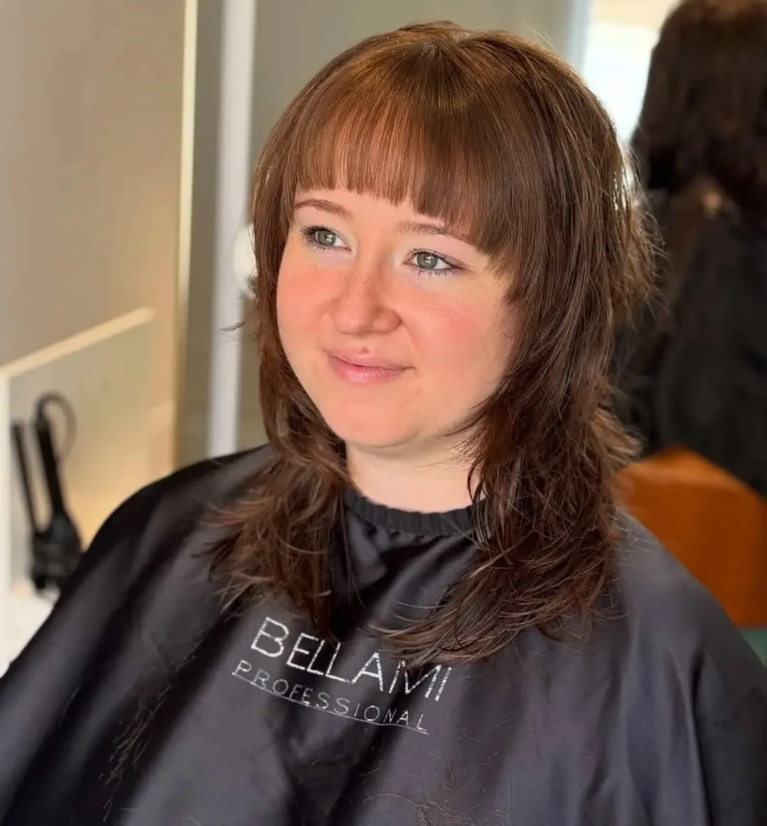 Medium shag haircut: shag with bottleneck bangs