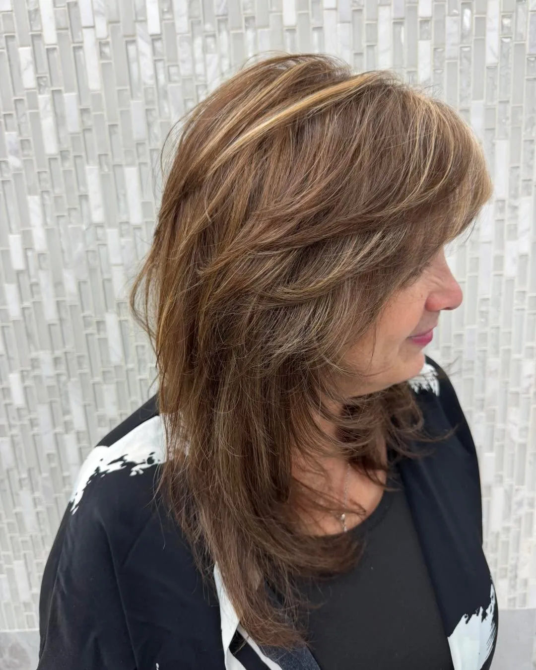 Medium shag haircut: shag with side-swept bangs
