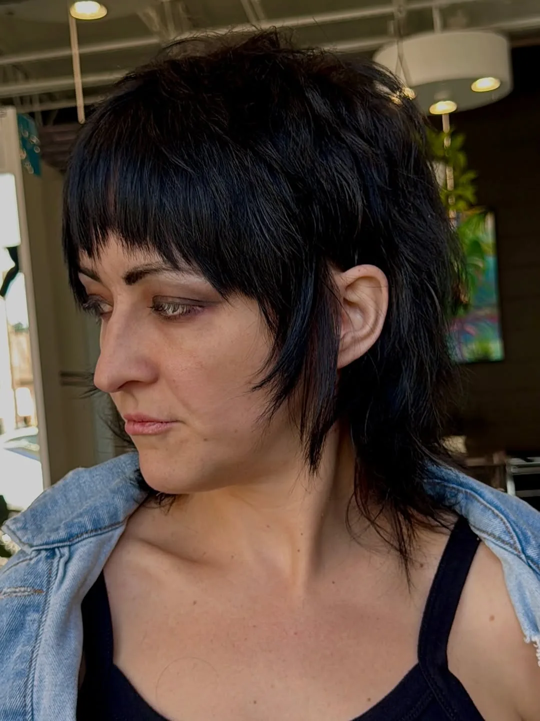 Shaggy wolf cut medium hair with choppy layers and textured ends